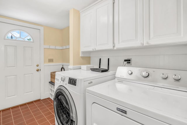 1511 Alna Rd, Alna, ME 04535 - washroom with cabinet space, washing machine and dryer, and dark tile patterned floors