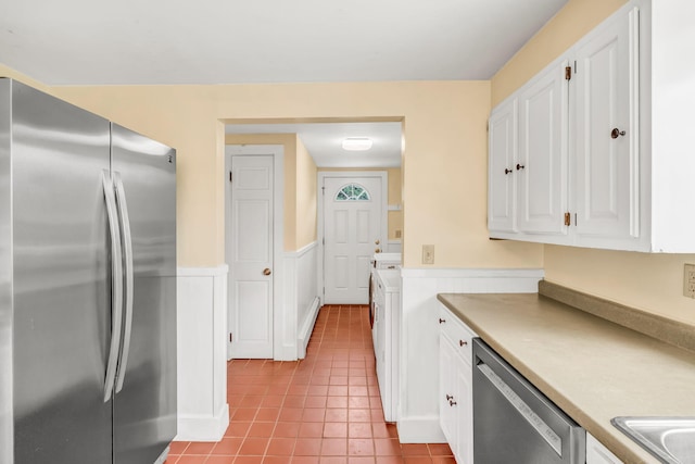 1511 Alna Rd, Alna, ME 04535 - kitchen featuring appliances with stainless steel finishes, white cabinets, wainscoting, tile patterned floors, and light countertops