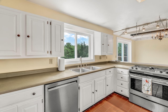 1511 Alna Rd, Alna, ME 04535 - kitchen with appliances with stainless steel finishes, white cabinets, and tile patterned floors