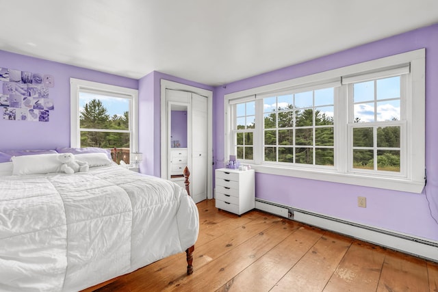 1511 Alna Rd, Alna, ME 04535 - bedroom featuring baseboard heating and light wood finished floors