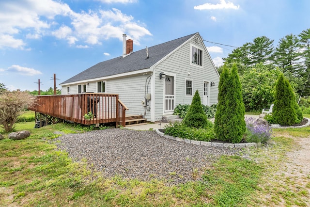 1511 Alna Rd, Alna, ME 04535 - rear view of house featuring a chimney, a deck, and roof with shingles