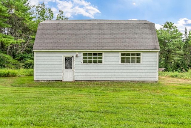 1511 Alna Rd, Alna, ME 04535 - rear view of house with a shingled roof, a gambrel roof, a yard, and an outdoor structure