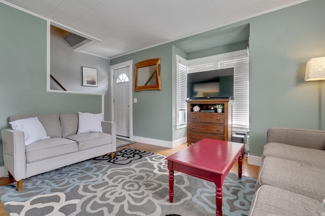 12 Maple St, Bath, ME 04530 - living area with wood finished floors and ornamental molding