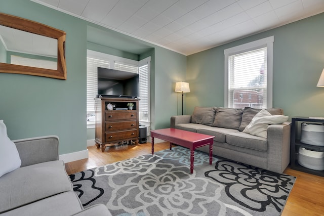 12 Maple St, Bath, ME 04530 - living room featuring crown molding and wood finished floors