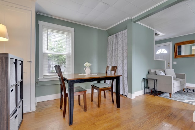 12 Maple St, Bath, ME 04530 - dining space with ornamental molding and light wood-style floors