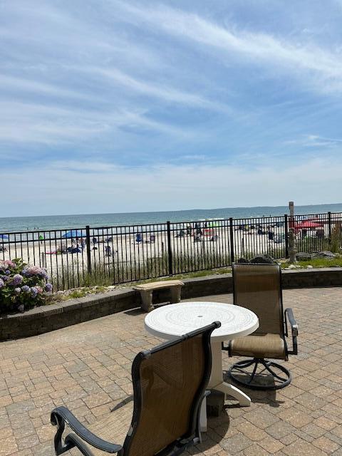 191 E Grand Ave Unit 506, Old Orchard Beach, ME 04064 - view of patio with view of water and beach