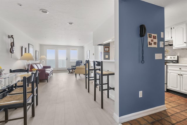 191 E Grand Ave Unit 506, Old Orchard Beach, ME 04064 - dining space featuring baseboards