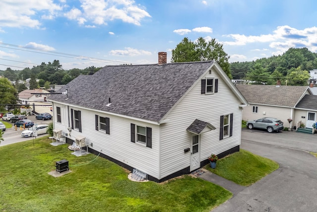 233 Northern Ave, Augusta, ME 04330 - view of front of property featuring a shingled roof, a chimney, and a front lawn