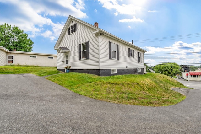 233 Northern Ave, Augusta, ME 04330 - view of home's exterior featuring a chimney and a yard