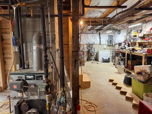 152 Cross Rd, Alna, ME 04535 - unfinished basement with electric panel and a heating unit