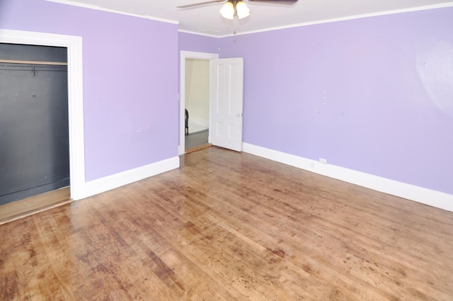 56 Holyoke St, Brewer, ME 04412 - unfurnished bedroom featuring crown molding, wood finished floors, and ceiling fan