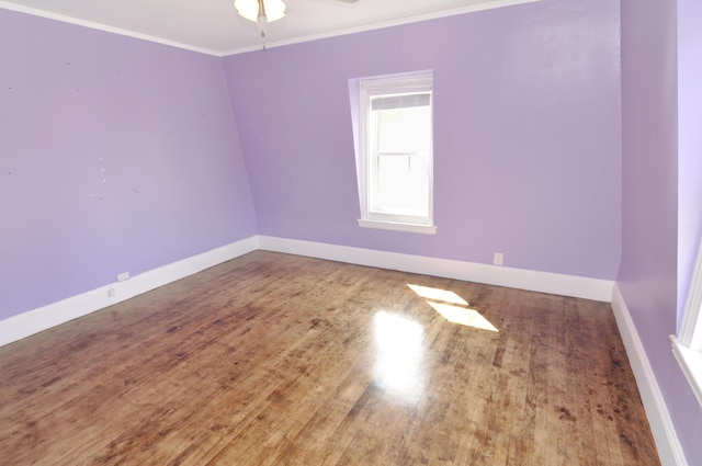 56 Holyoke St, Brewer, ME 04412 - empty room featuring wood finished floors, crown molding, and ceiling fan