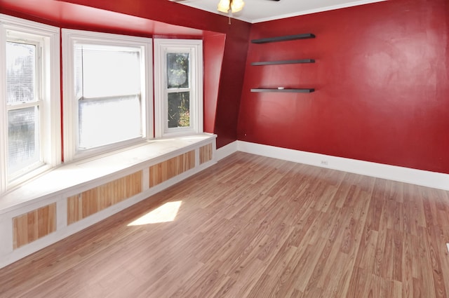 56 Holyoke St, Brewer, ME 04412 - empty room with wood finished floors, ceiling fan, and ornamental molding