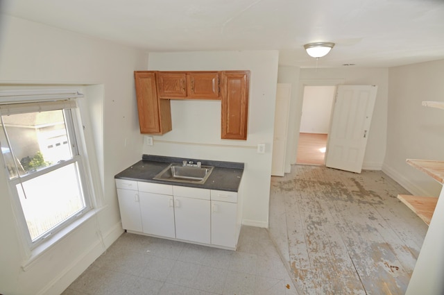 56 Holyoke St, Brewer, ME 04412 - kitchen featuring dark countertops and a sink
