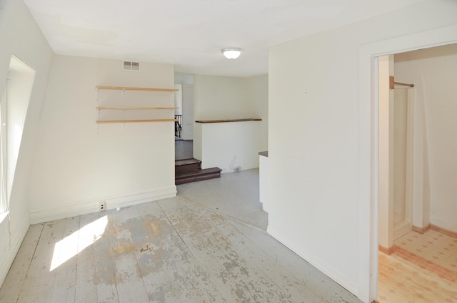 56 Holyoke St, Brewer, ME 04412 - empty room featuring baseboards and stairway