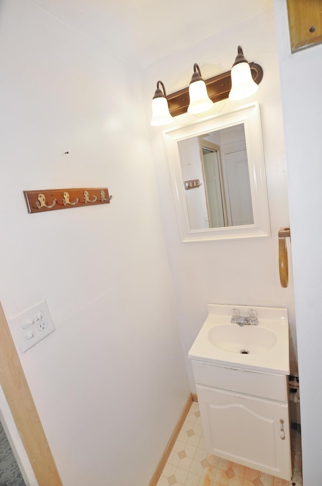 56 Holyoke St, Brewer, ME 04412 - bathroom with vanity and baseboards