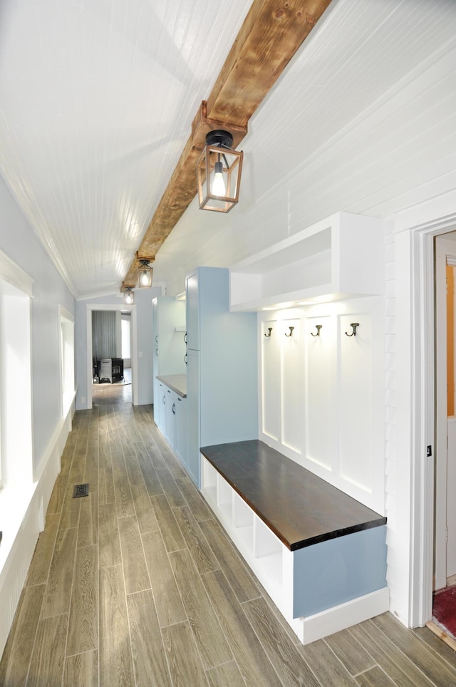 56 Holyoke St, Brewer, ME 04412 - mudroom with wood finished floors, beamed ceiling, and ornamental molding