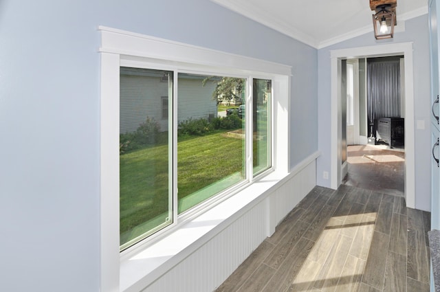 56 Holyoke St, Brewer, ME 04412 - hallway featuring ornamental molding, dark wood finished floors, and vaulted ceiling