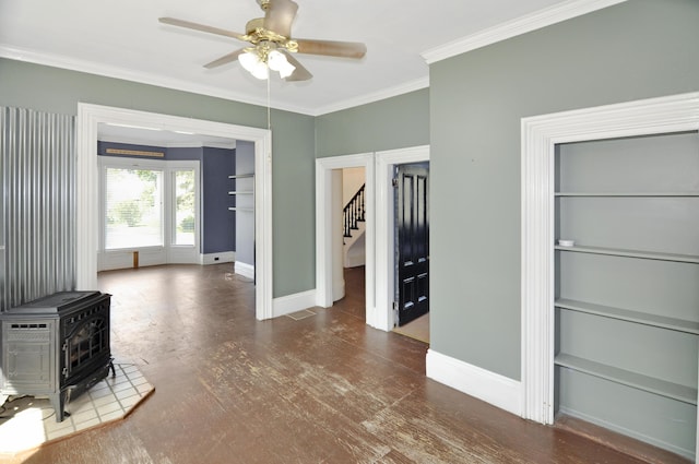 56 Holyoke St, Brewer, ME 04412 - unfurnished living room featuring stairway, a wood stove, ceiling fan, crown molding, and wood finished floors