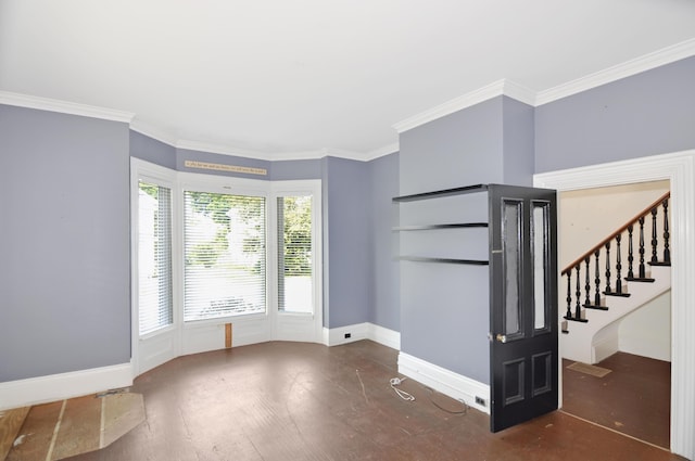 56 Holyoke St, Brewer, ME 04412 - unfurnished living room with wood finished floors, stairway, and ornamental molding