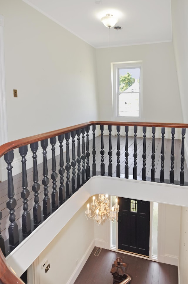 56 Holyoke St, Brewer, ME 04412 - stairway with a chandelier and crown molding