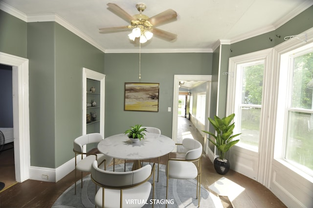 56 Holyoke St, Brewer, ME 04412 - dining space with plenty of natural light, wood finished floors, ceiling fan, and ornamental molding