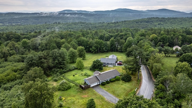 704 Brighton Hill Rd, Minot, ME 04258 - aerial view of property's location featuring a forest and a mountain backdrop