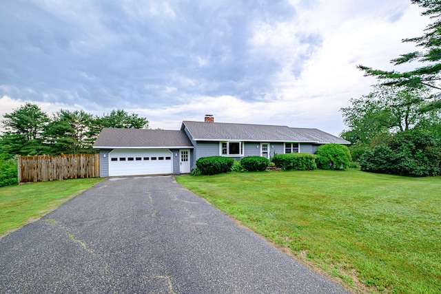 704 Brighton Hill Rd, Minot, ME 04258 - ranch-style house featuring a garage, asphalt driveway, a chimney, and a shingled roof