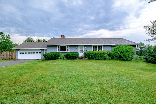 704 Brighton Hill Rd, Minot, ME 04258 - single story home with an attached garage, driveway, and a chimney