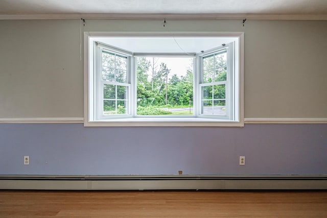 704 Brighton Hill Rd, Minot, ME 04258 - empty room with ornamental molding and wood finished floors