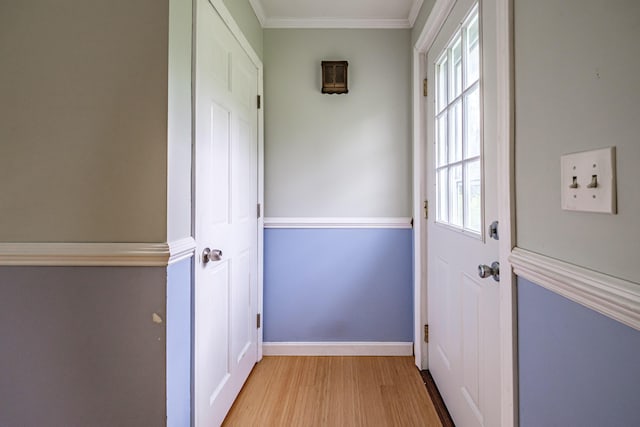 704 Brighton Hill Rd, Minot, ME 04258 - entryway with light wood-type flooring, crown molding, and plenty of natural light