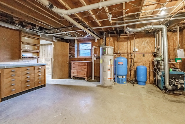 704 Brighton Hill Rd, Minot, ME 04258 - basement with a water pressure tank, hybrid water heater, and a heating unit