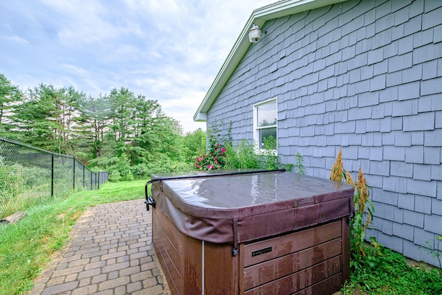 704 Brighton Hill Rd, Minot, ME 04258 - view of patio featuring a hot tub