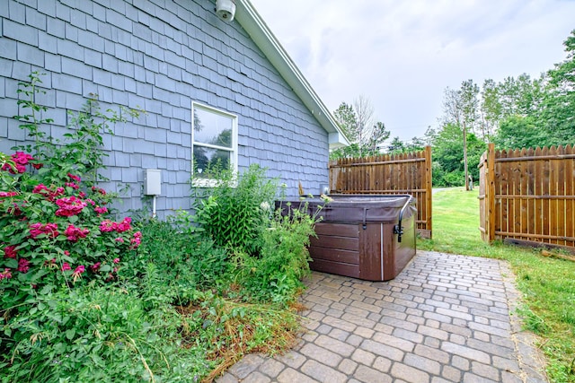704 Brighton Hill Rd, Minot, ME 04258 - view of patio / terrace with a hot tub