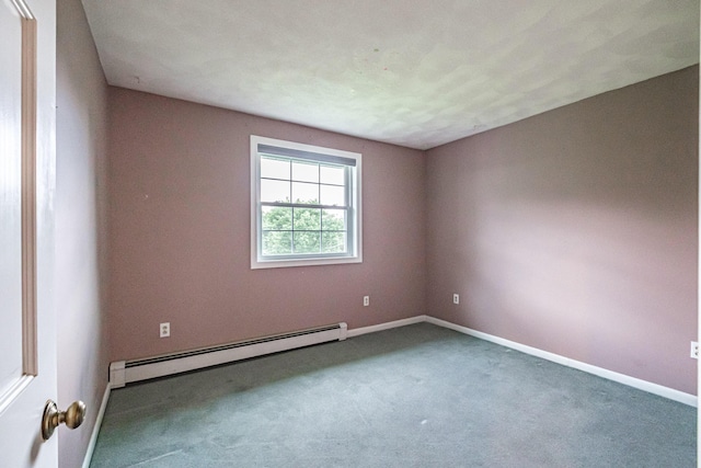 704 Brighton Hill Rd, Minot, ME 04258 - spare room featuring a baseboard heating unit and carpet floors