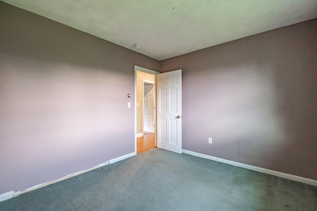 704 Brighton Hill Rd, Minot, ME 04258 - spare room with dark carpet and a smoke detector