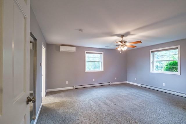 704 Brighton Hill Rd, Minot, ME 04258 - unfurnished room with a baseboard radiator, a wall unit AC, baseboard heating, and carpet
