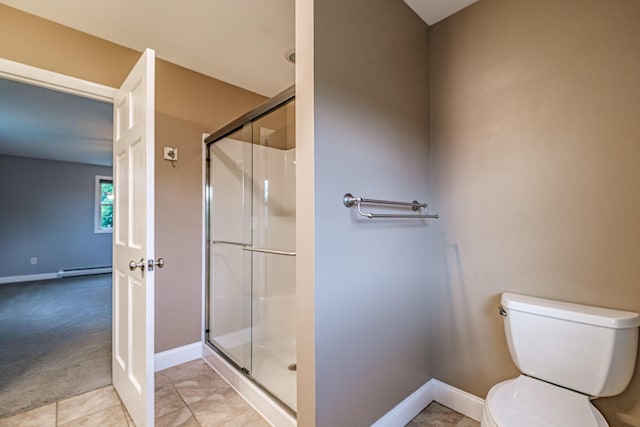 704 Brighton Hill Rd, Minot, ME 04258 - bathroom with a shower stall, a baseboard heating unit, and tile patterned flooring