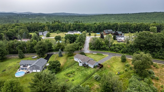 704 Brighton Hill Rd, Minot, ME 04258 - aerial view of property and surrounding area with a heavily wooded area