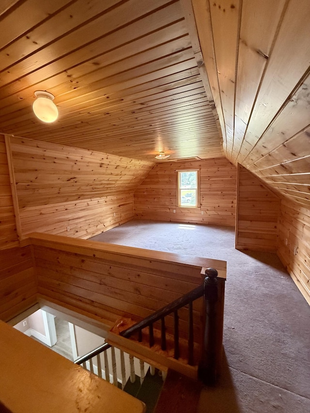 69 Lafayette St, Calais, ME 04619 - additional living space with wood walls, wood ceiling, carpet flooring, and vaulted ceiling