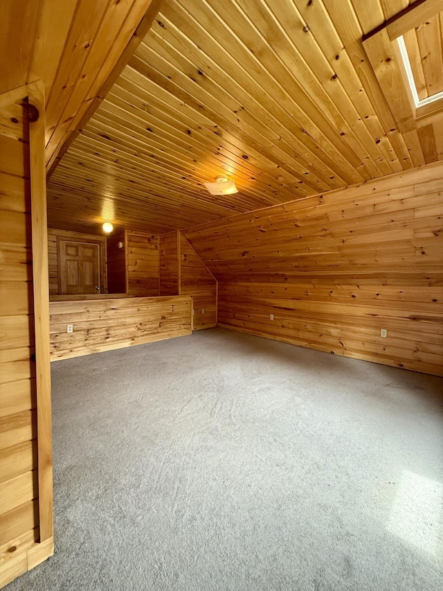 69 Lafayette St, Calais, ME 04619 - additional living space featuring wooden walls, wooden ceiling, carpet floors, and lofted ceiling