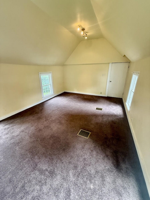 69 Lafayette St, Calais, ME 04619 - additional living space featuring vaulted ceiling and carpet