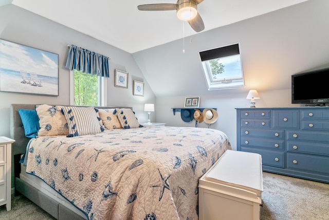 68 Appletree Ln, Wells, ME 04090 - bedroom with carpet, a skylight, vaulted ceiling, and a ceiling fan