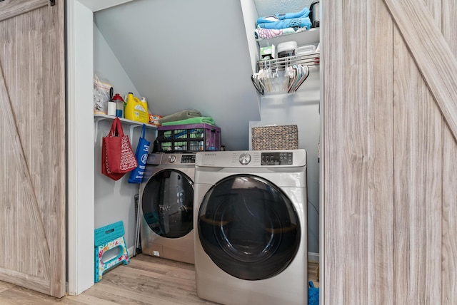 68 Appletree Ln, Wells, ME 04090 - laundry room with washing machine and clothes dryer and wood finished floors