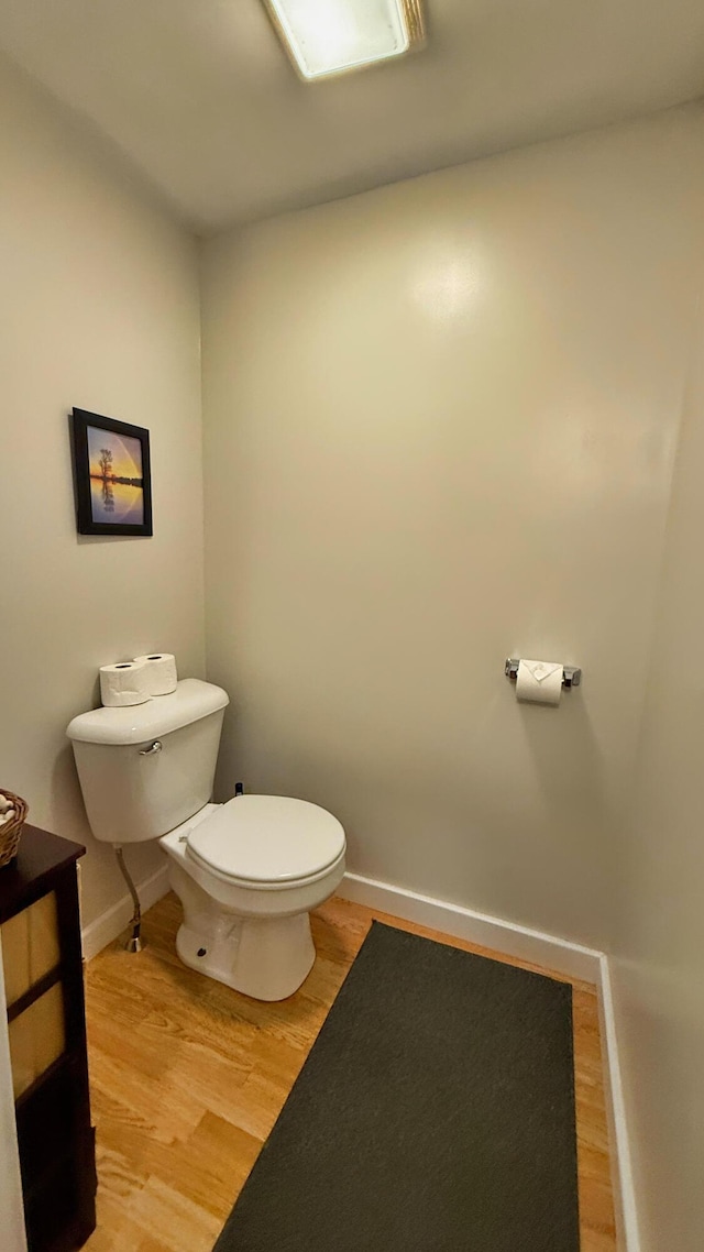 9 County Rd, Lubec, ME 04652 - half bath featuring toilet and wood finished floors