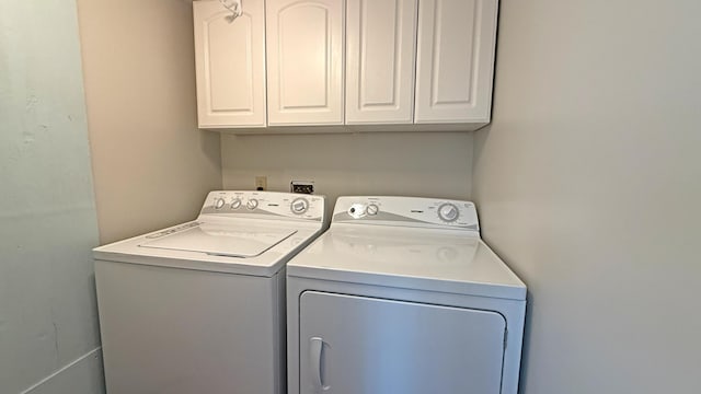 9 County Rd, Lubec, ME 04652 - washroom featuring washing machine and dryer and cabinet space