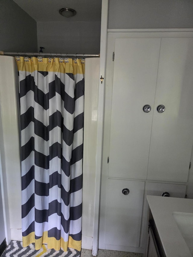 125 Connecticut Ave, Millinocket, ME 04462 - full bathroom featuring speckled floor, vanity, and a shower with shower curtain