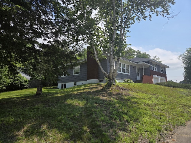 125 Connecticut Ave, Millinocket, ME 04462 - view of front of home featuring an attached garage