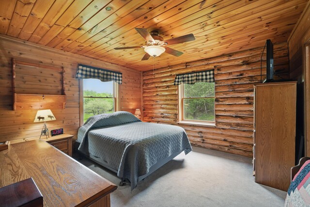 23 Mccutcheon Way, Sidney, ME 04330 - carpeted bedroom featuring wood ceiling, ceiling fan, and rustic walls