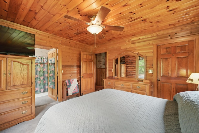 23 Mccutcheon Way, Sidney, ME 04330 - bedroom featuring light carpet, wood ceiling, wood walls, and a ceiling fan